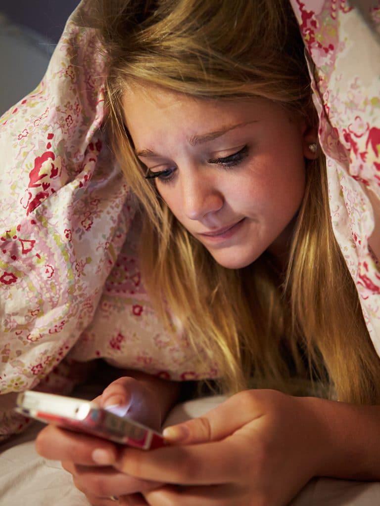 More Than Hour a Day of Screen Time Tied to Teen Unhappiness